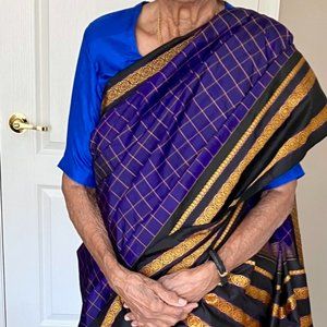 Blue Kanjivaran saree with gold border